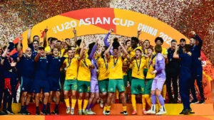 Australia vs Italy U20 World Cup 2025 - Australian U20 soccer team celebrating on stage with confetti after winning the U20 Asian Cup China 2025
